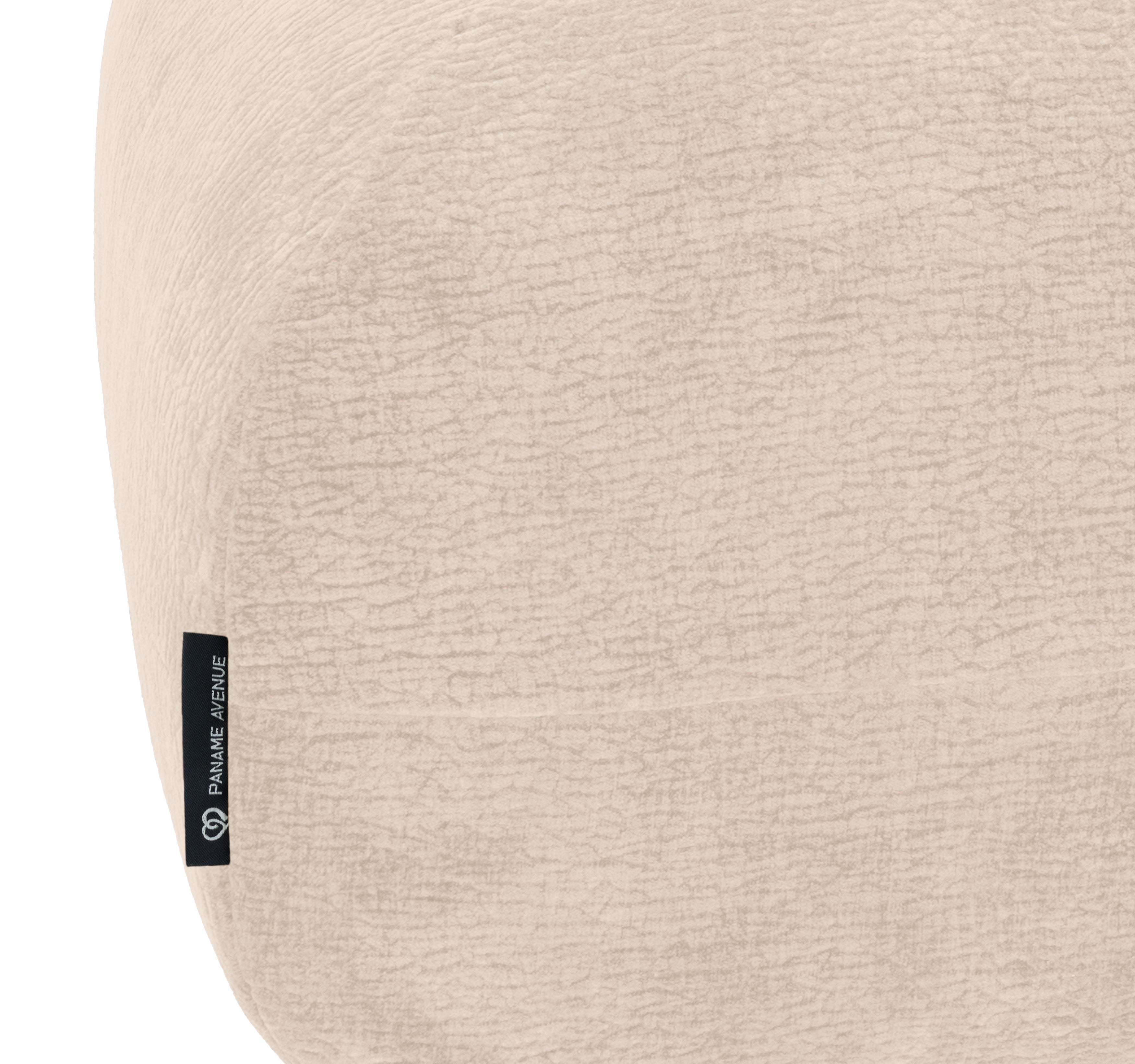 Pouf Blainville en tissu chenille beige Paname Avenue, détail du label de la marque
