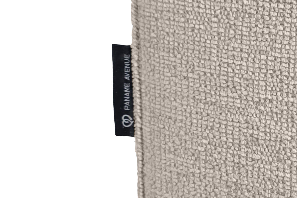 Pouf Écouffes en tissu chenille beige Paname Avenue, détail du label de la marque