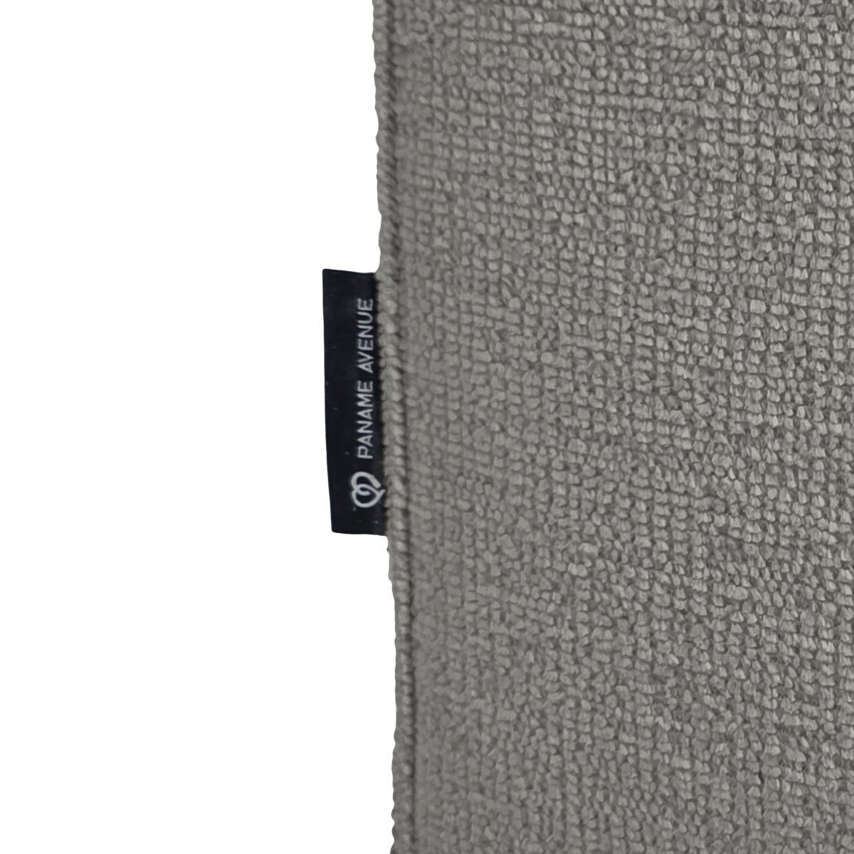 Pouf Écouffes en tissu chenille gris Paname Avenue, détail du label de la marque