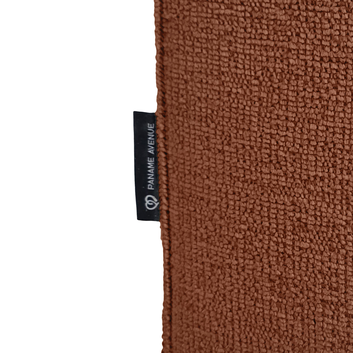 Pouf Écouffes en tissu chenille terracotta Paname Avenue, détail du label de la marque