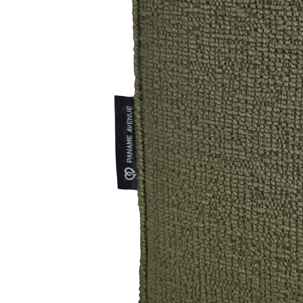 Pouf Écouffes en tissu chenille vert olive Paname Avenue, détail du label de la marque