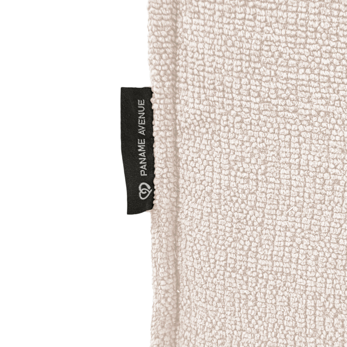 Canapé d’angle droit Prévôt en tissu chenille beige Paname Avenue, détail du label de la marque