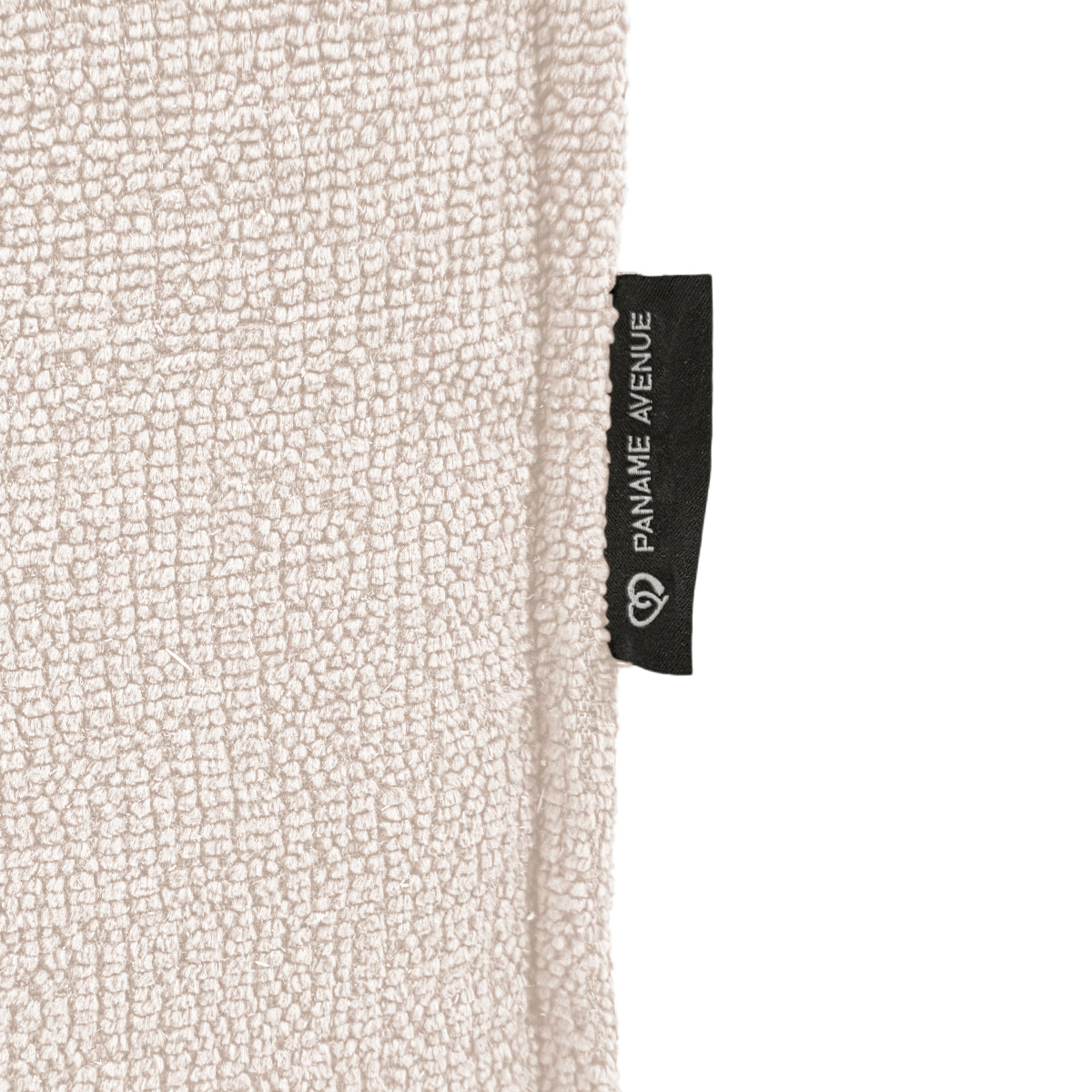 Canapé d’angle gauche Prévôt en tissu chenille beige Paname Avenue, détail du label de la marque