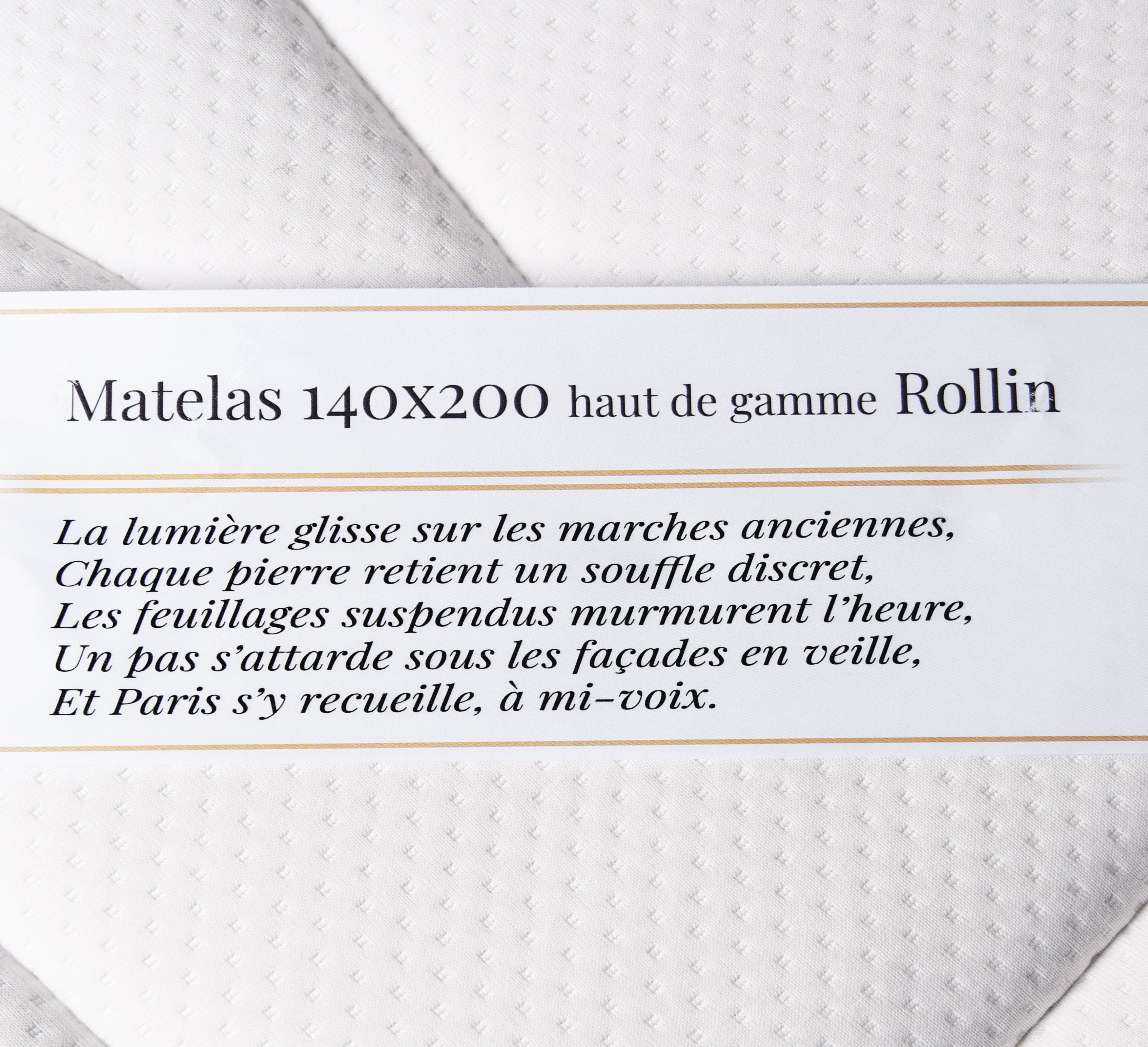 Étiquette du matelas 140x200cm Rollin mousse premium 35kg/m3 avec poème Paname Avenue sur fond blanc