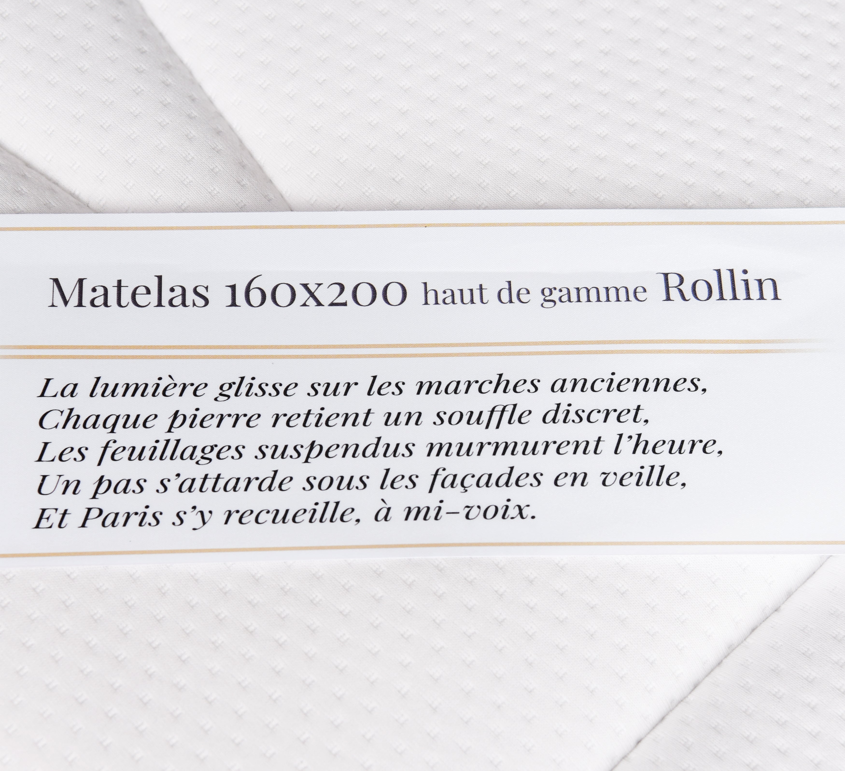 Étiquette du matelas 160x200cm Rollin mousse premium 35kg/m3 avec poème Paname Avenue sur fond blanc