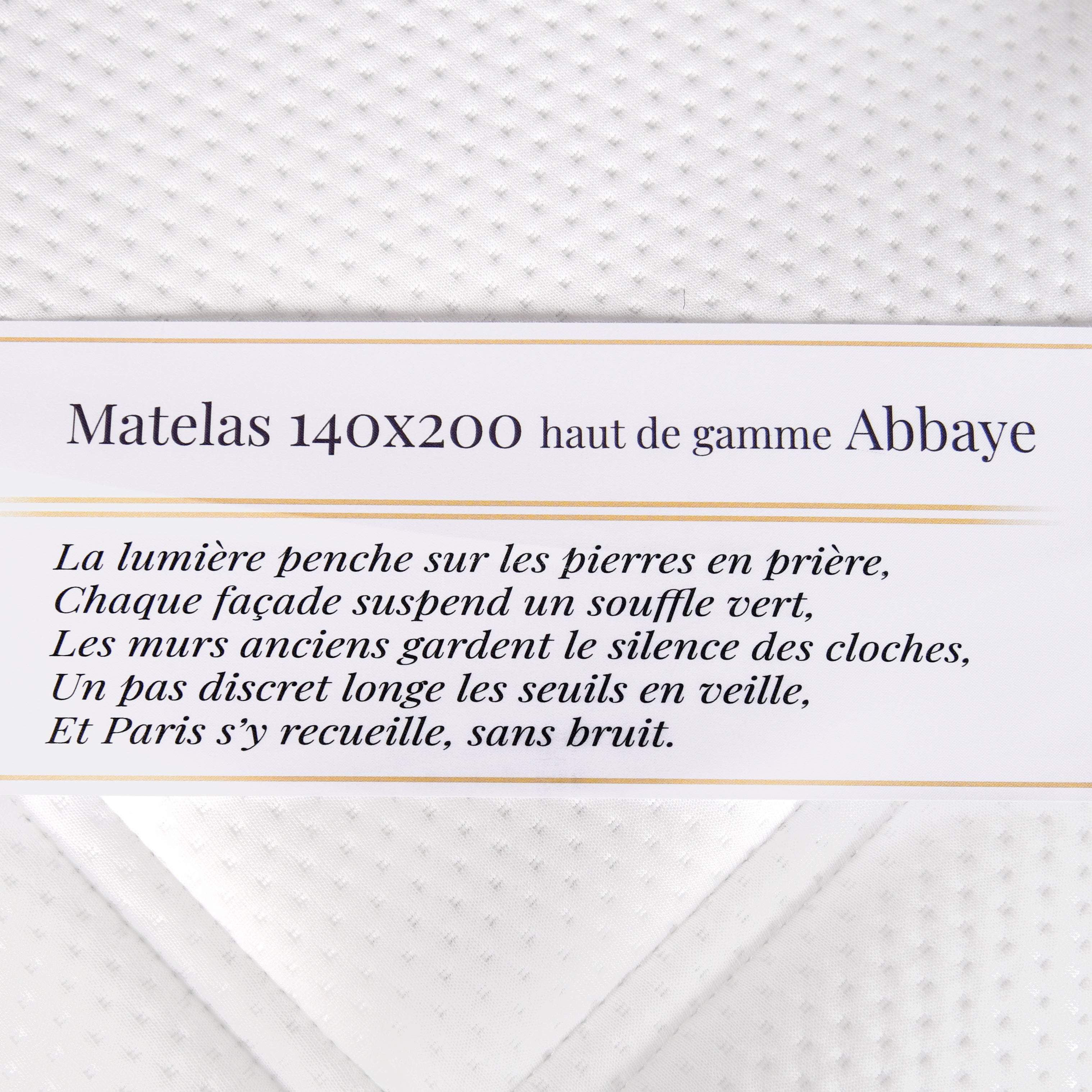 Étiquette du matelas 140x200cm Abbaye 28cm ressorts ensachés 35kg/m3 avec poème Paname Avenue sur fond blanc