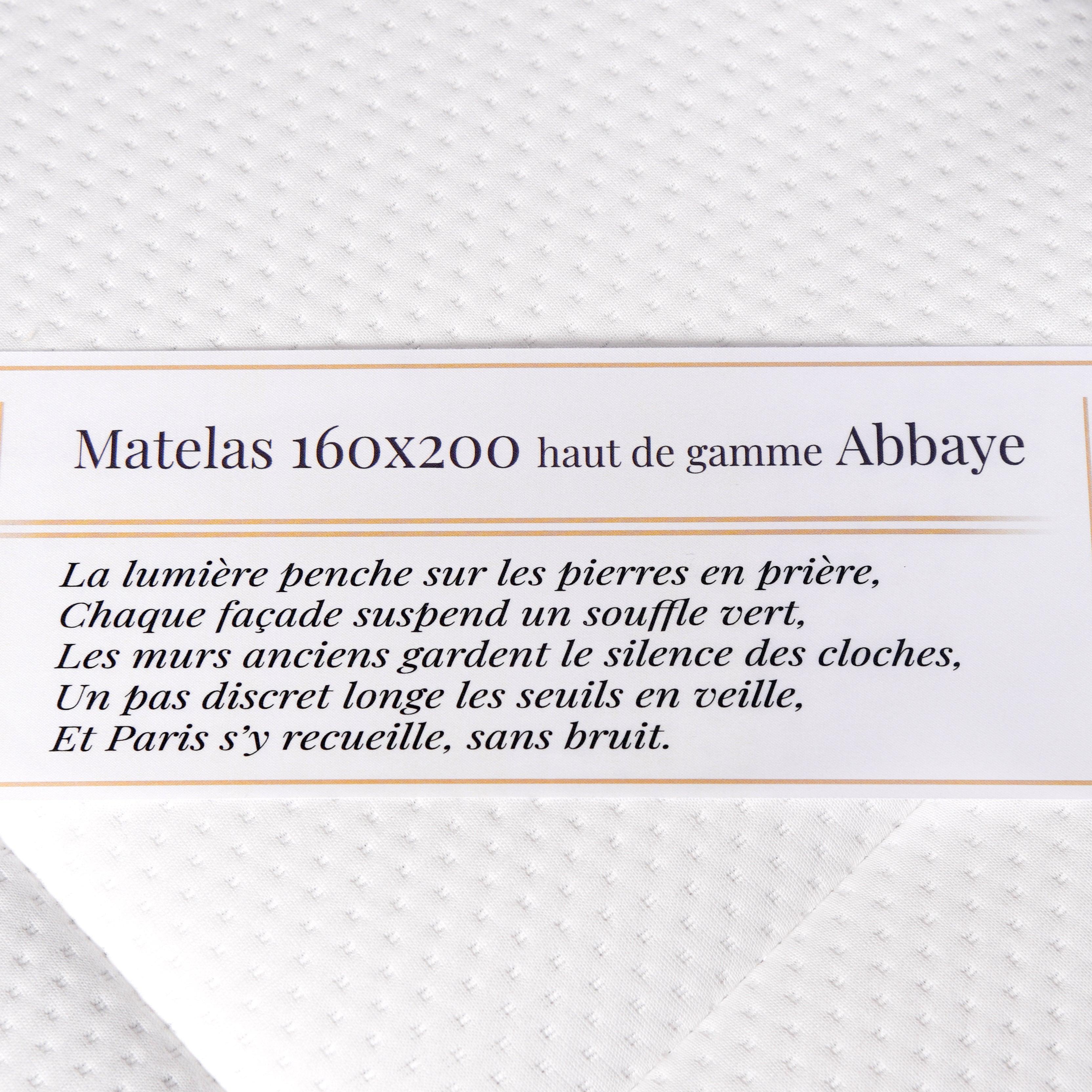 Étiquette du matelas 160x200cm Abbaye 28cm ressorts ensachés 35kg/m3 avec poème Paname Avenue sur fond blanc