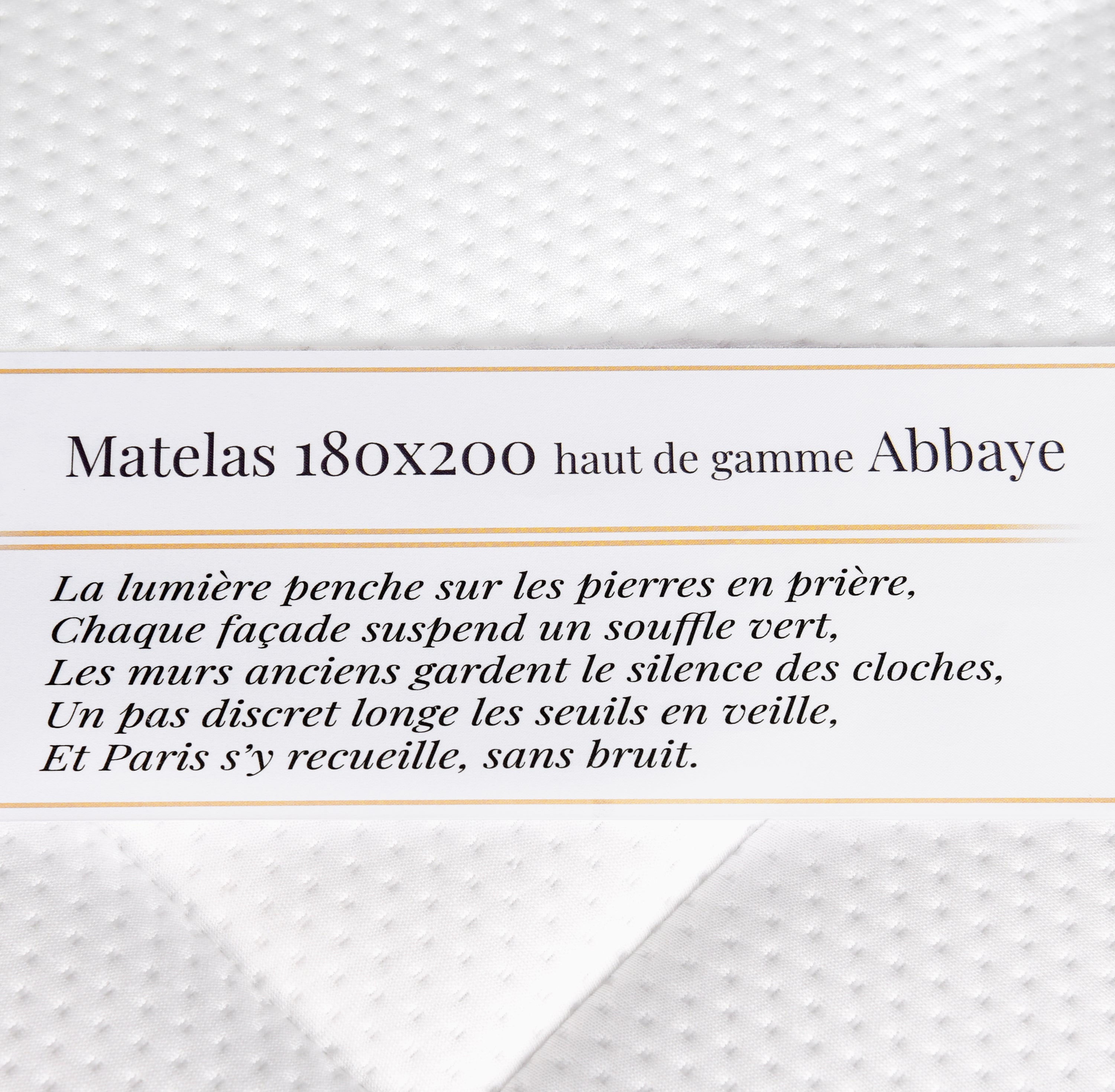 Étiquette du matelas 180x200cm Abbaye 28cm ressorts ensachés 35kg/m3 avec poème Paname Avenue sur fond blanc