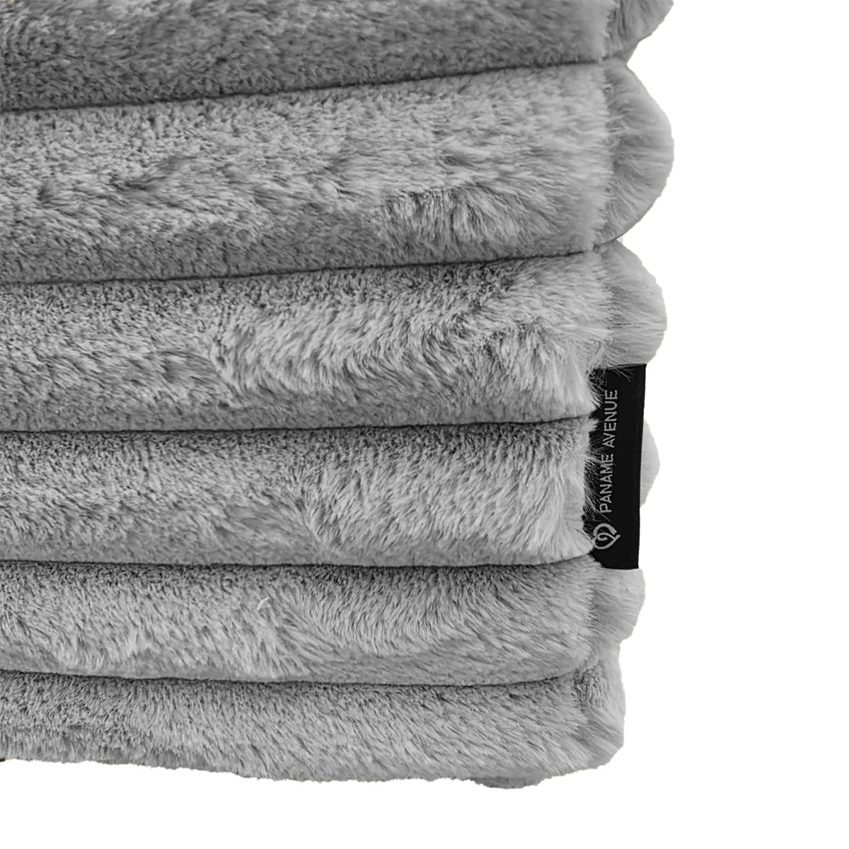 Pouf Norvins en tissu velours gros côtelé gris clair Paname Avenue, détail du label de la marque