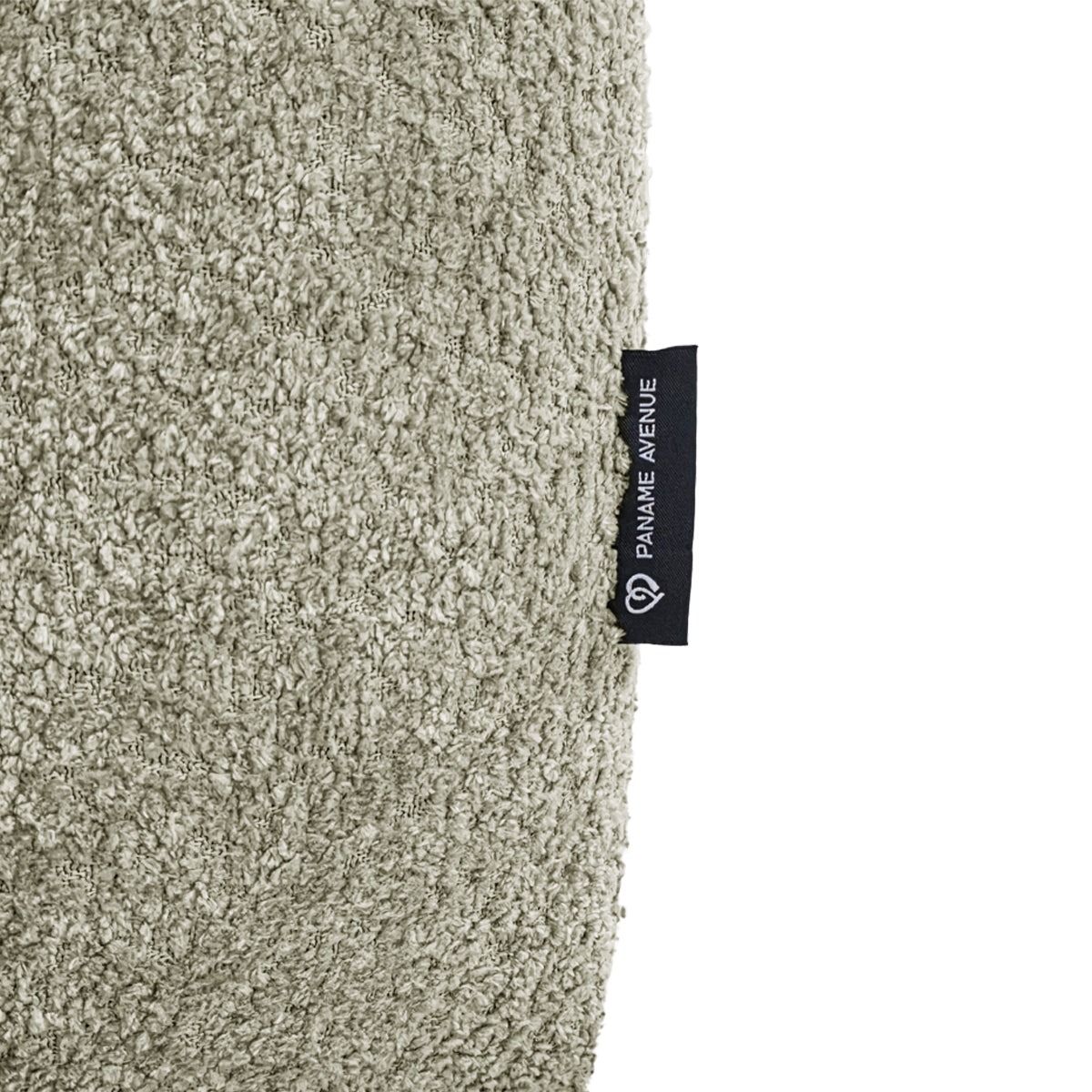 Pouf Taylor en tissu bouclette beige Paname Avenue, détail du label de la marque