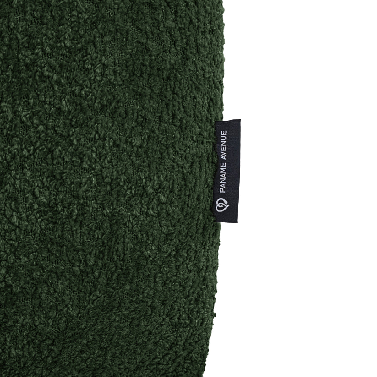 Pouf Taylor en tissu bouclette vert Paname Avenue, détail du label de la marque
