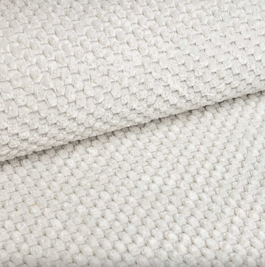 Gros plan de la texture du tissu chenille Ponceau blanc.